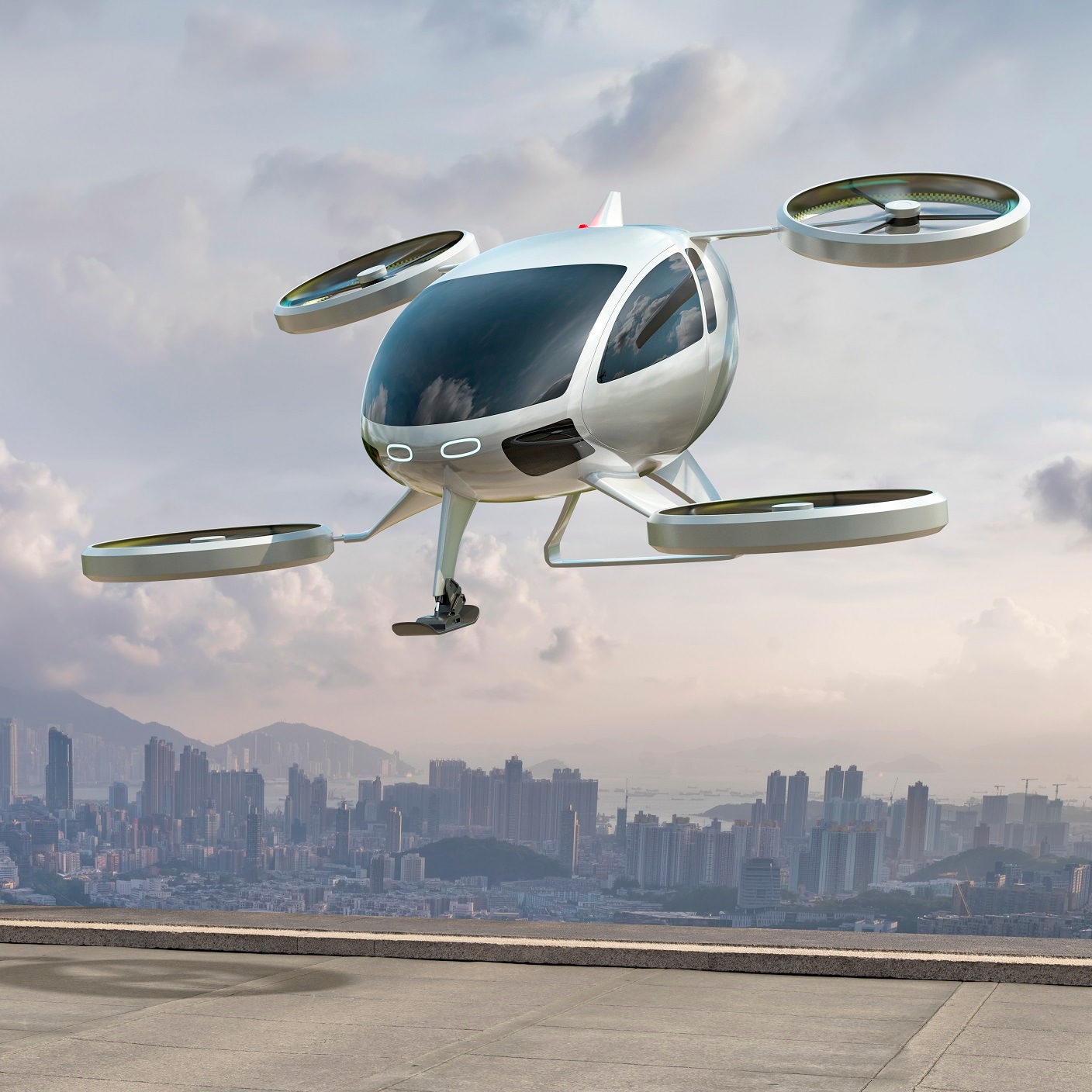 A generic white electric powered Vertical Take Off and Landing eVTOL aircraft with four rotors