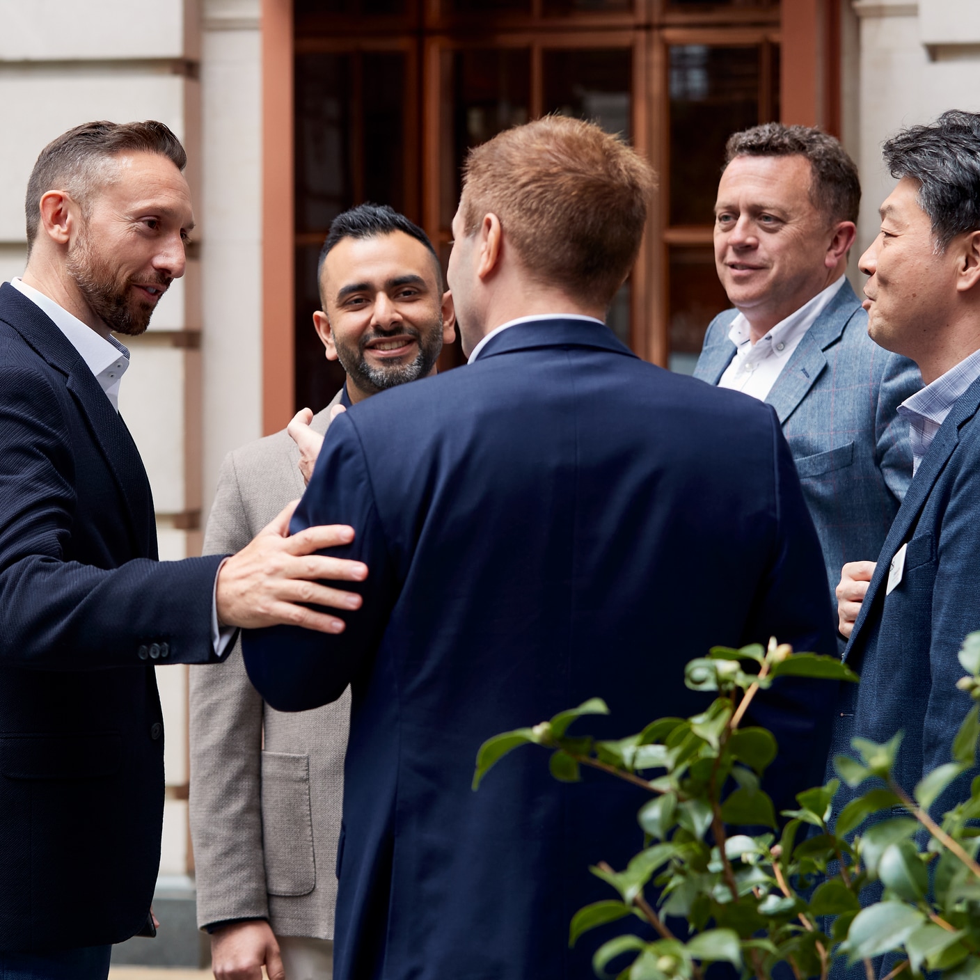 Group of colleagues discussing together