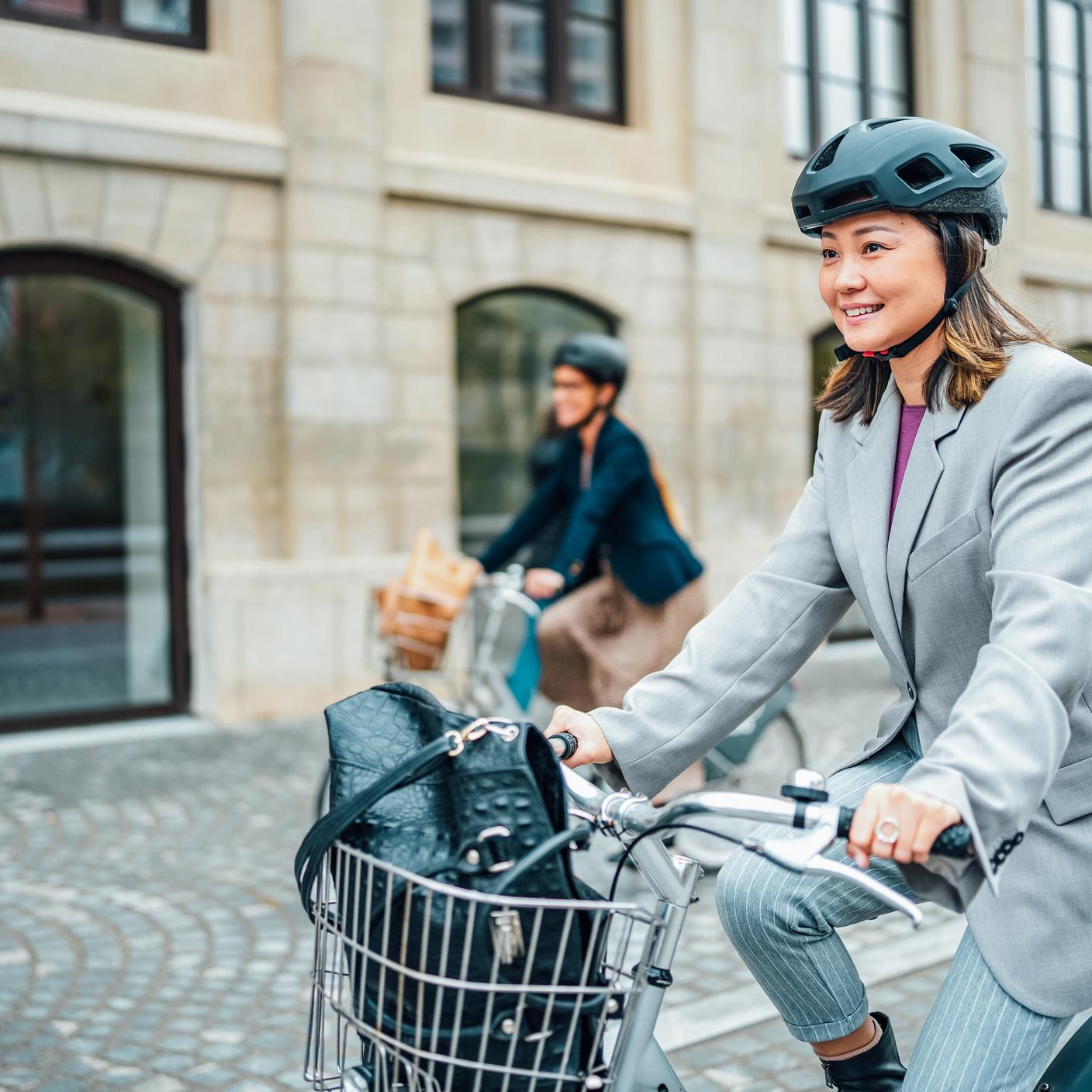 Professionals commute with helmet for safety