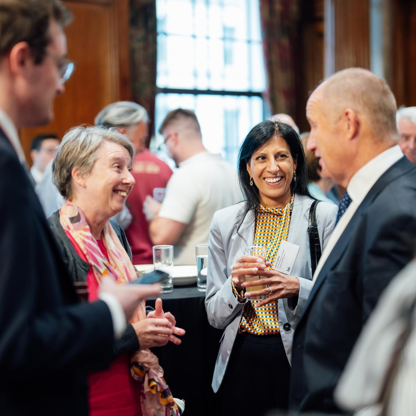 People discussing at event