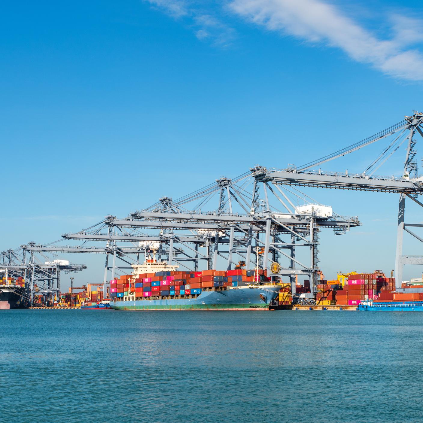 Container ship loading and unloading in sea port