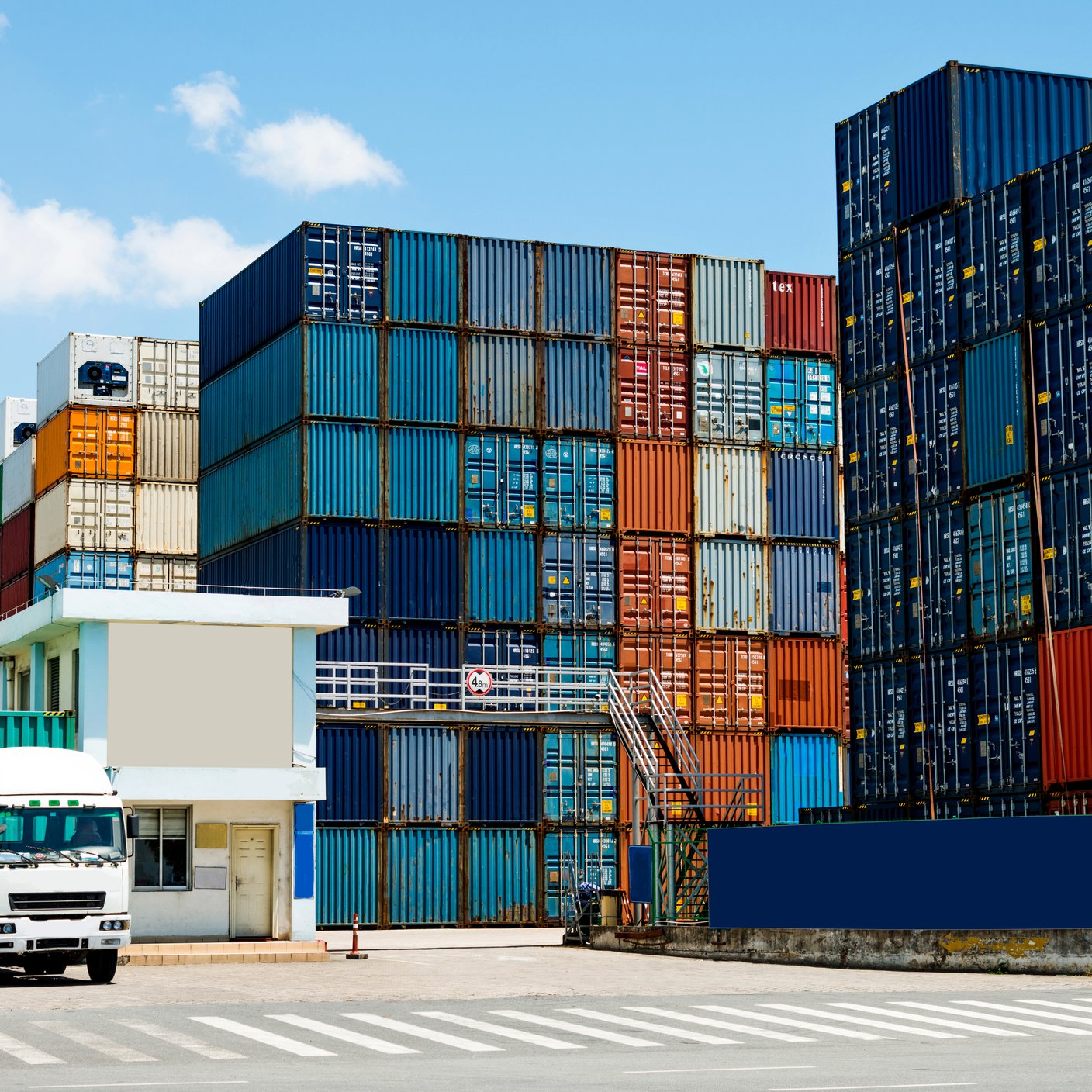 Truck transport container leaving the harbor.