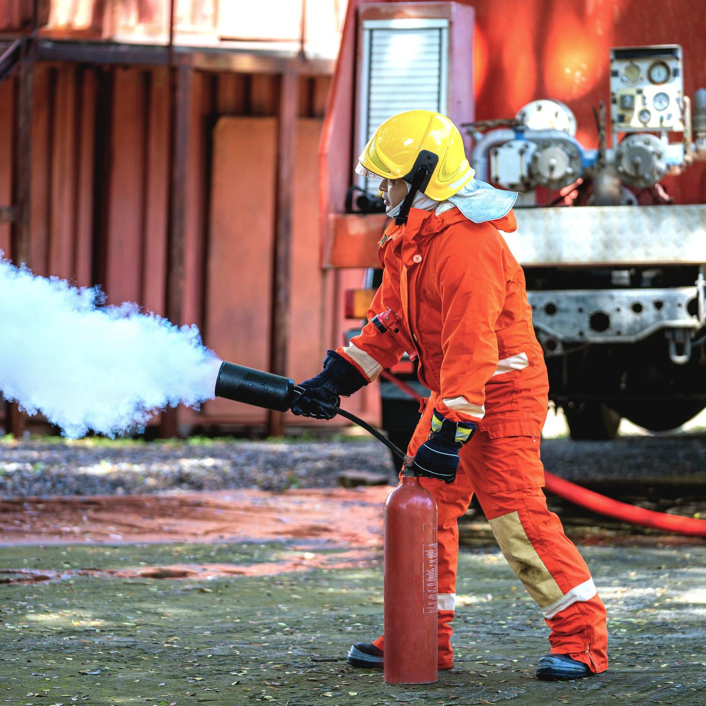 firefighter wearing full equipment and emergency rescue equipment