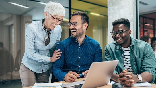  Business people laughing togheter at work