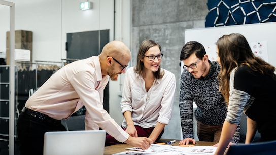 Three people in a meeting